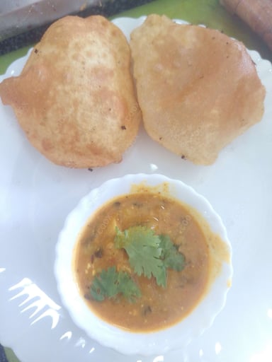 Tasty Poori Bhaji cooked by COOX chefs cooks during occasions parties events at home