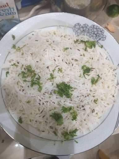 Delicious Jeera Rice prepared by COOX