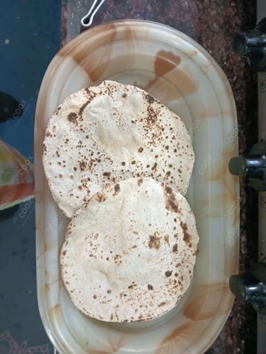 Delicious Tawa Rotis prepared by COOX