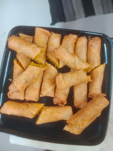 Delicious Veg Spring Rolls prepared by COOX