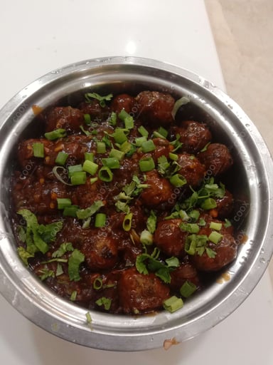 Delicious Veg Manchurian (Dry) prepared by COOX