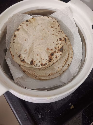 Delicious Tawa Rotis prepared by COOX