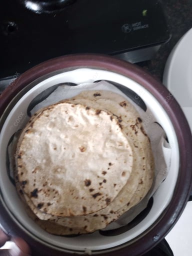 Delicious Tawa Rotis prepared by COOX