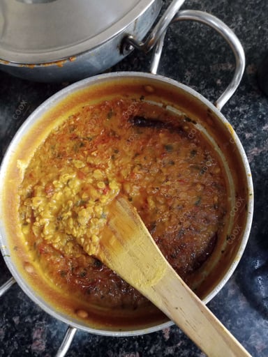 Delicious Dal Tadka prepared by COOX