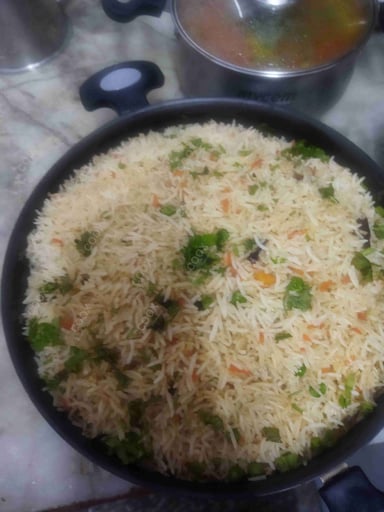 Delicious Veg Biryani prepared by COOX