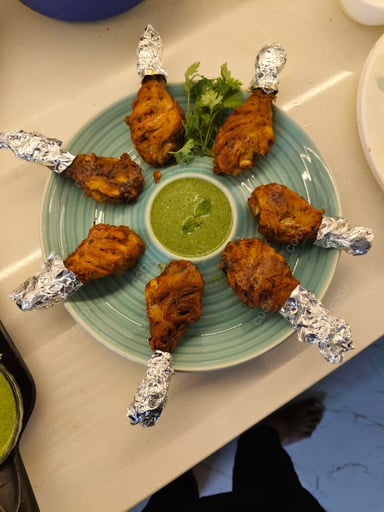 Delicious Chicken Tikka prepared by COOX