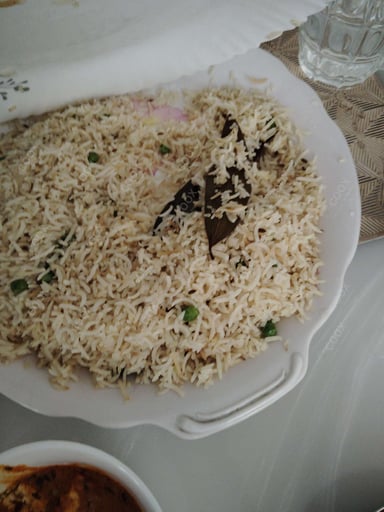 Delicious Jeera Rice prepared by COOX