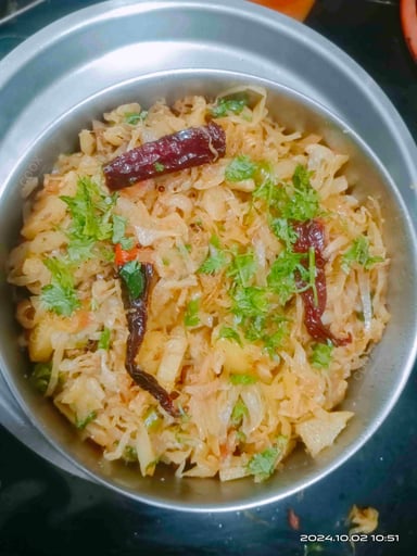 Delicious Aloo Patta Gobhi prepared by COOX