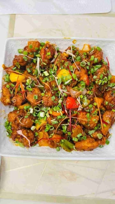 Delicious Chilli Paneer (Gravy) prepared by COOX