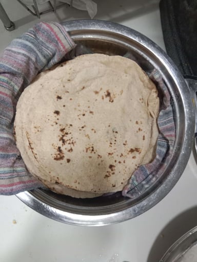 Delicious Tawa Rotis prepared by COOX