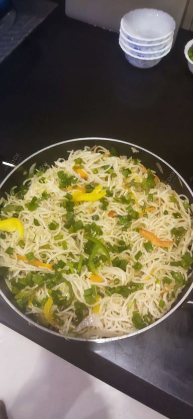 Delicious Veg Hakka Noodles prepared by COOX