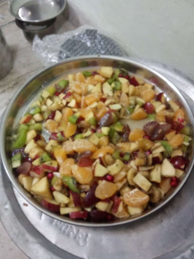 Tasty Fruit Chaat cooked by COOX chefs cooks during occasions parties events at home