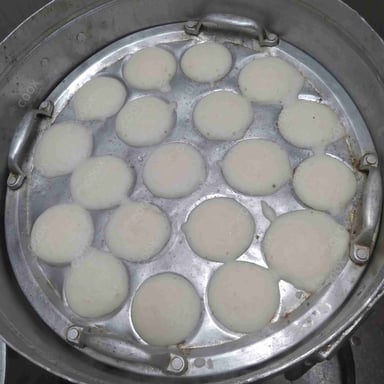 Tasty Plain Idli cooked by COOX chefs cooks during occasions parties events at home