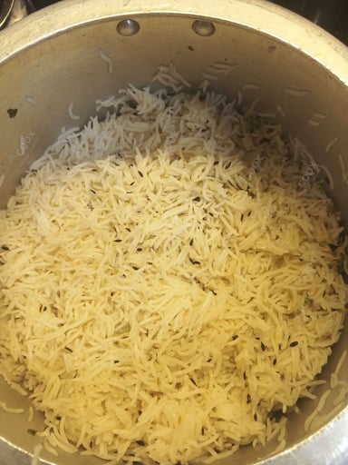 Delicious Jeera Rice prepared by COOX