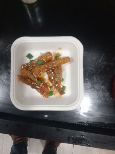 Delicious Honey Chilli Potato prepared by COOX