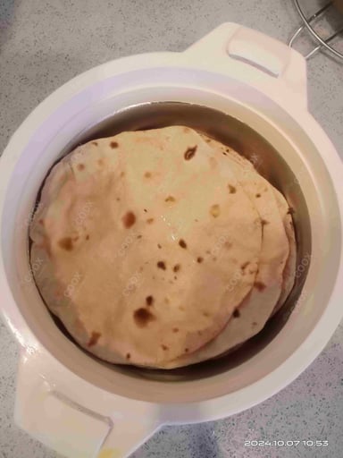 Delicious Tawa Rotis prepared by COOX