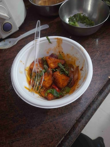 Delicious Chilli Paneer (Dry) prepared by COOX