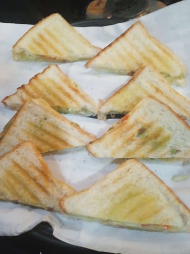 Tasty Grilled Veg Sandwiches cooked by COOX chefs cooks during occasions parties events at home