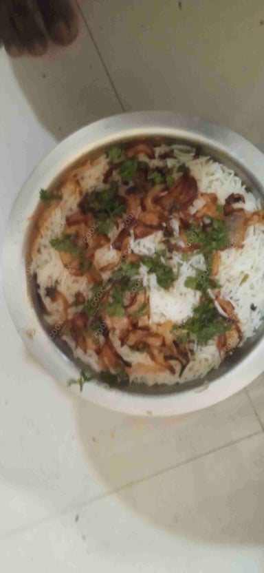 Tasty Egg Biryani cooked by COOX chefs cooks during occasions parties events at home