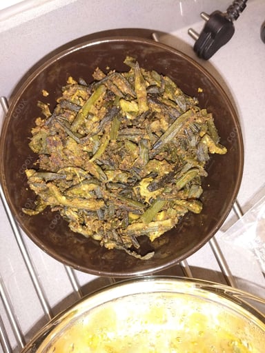 Delicious Kurkuri Bhindi prepared by COOX