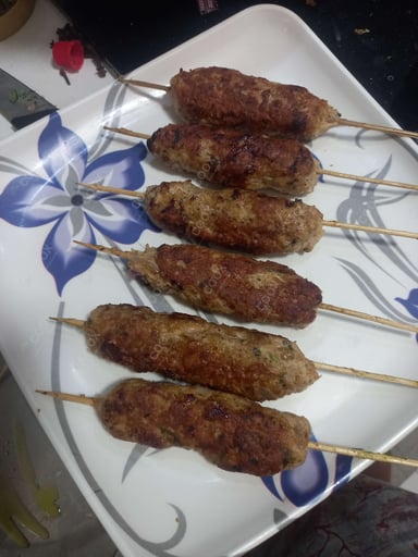 Tasty Chicken Seekh Kebab cooked by COOX chefs cooks during occasions parties events at home