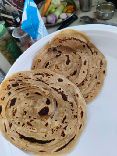 Delicious Lachha Paranthas prepared by COOX