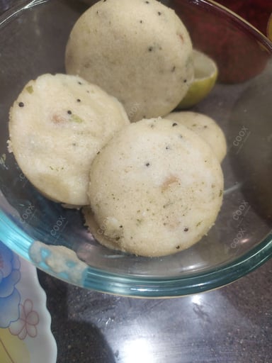 Tasty Plain Idli cooked by COOX chefs cooks during occasions parties events at home