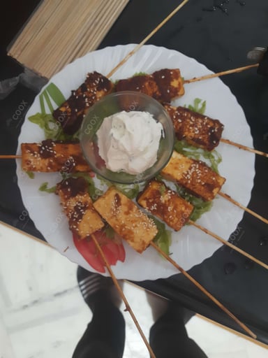 Tasty Thai Paneer Satay cooked by COOX chefs cooks during occasions parties events at home