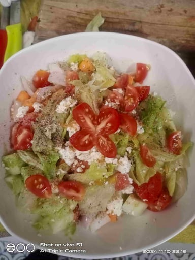 Tasty Greek Salad cooked by COOX chefs cooks during occasions parties events at home