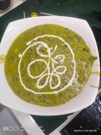 Tasty Sarso Ka Saag cooked by COOX chefs cooks during occasions parties events at home