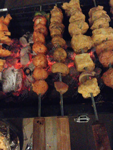 Tasty Mushroom Tikka cooked by COOX chefs cooks during occasions parties events at home