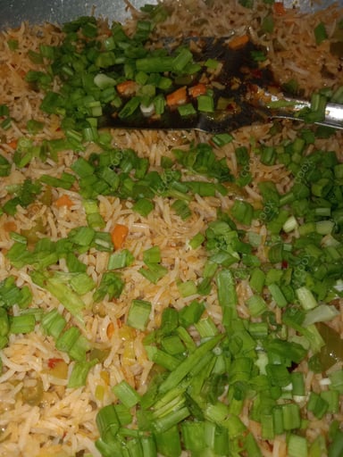 Tasty Schezwan Fried Rice cooked by COOX chefs cooks during occasions parties events at home