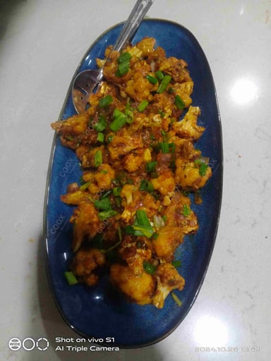 Tasty Gobi Manchurian cooked by COOX chefs cooks during occasions parties events at home