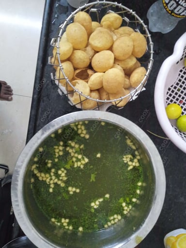 Tasty Gol Gappe (Pani Puri) cooked by COOX chefs cooks during occasions parties events at home