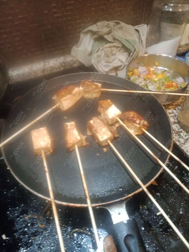 Tasty Thai Paneer Satay cooked by COOX chefs cooks during occasions parties events at home