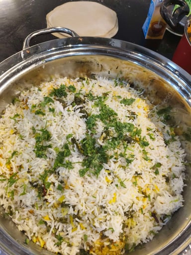 Tasty Egg Biryani cooked by COOX chefs cooks during occasions parties events at home