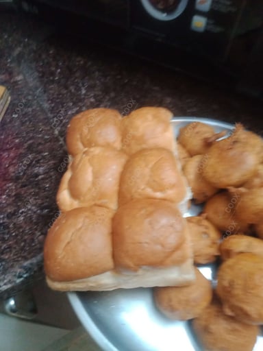 Tasty Vada Pav cooked by COOX chefs cooks during occasions parties events at home