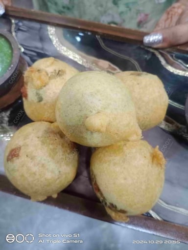 Tasty Aloo Bonda cooked by COOX chefs cooks during occasions parties events at home