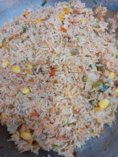 Tasty Mexican Rice cooked by COOX chefs cooks during occasions parties events at home