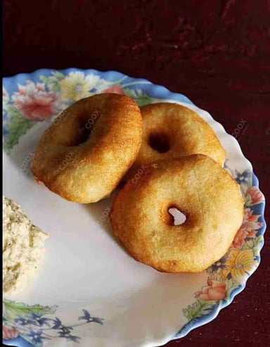 Tasty Medu Vada cooked by COOX chefs cooks during occasions parties events at home