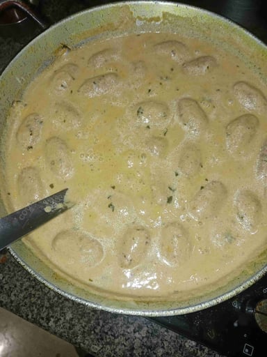 Tasty Malai Kofta (White Gravy) cooked by COOX chefs cooks during occasions parties events at home