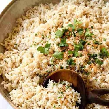 Tasty Coconut Rice cooked by COOX chefs cooks during occasions parties events at home