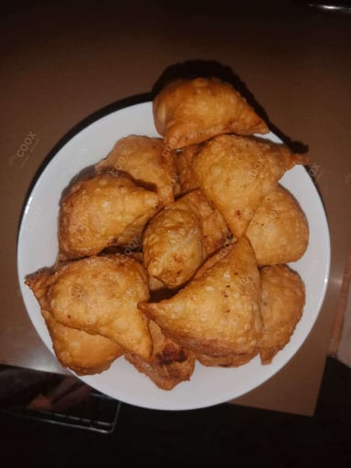 Delicious Mini Samosas prepared by COOX