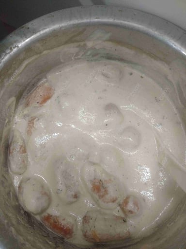 Tasty Malai Kofta (White Gravy) cooked by COOX chefs cooks during occasions parties events at home