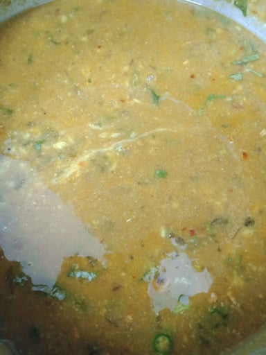 Tasty Urad Dal cooked by COOX chefs cooks during occasions parties events at home