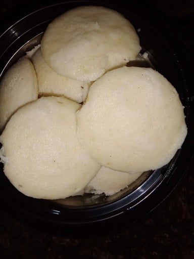 Tasty Plain Idli cooked by COOX chefs cooks during occasions parties events at home