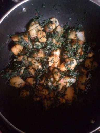 Tasty Aloo Methi cooked by COOX chefs cooks during occasions parties events at home