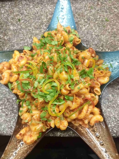 Tasty Macaroni cooked by COOX chefs cooks during occasions parties events at home