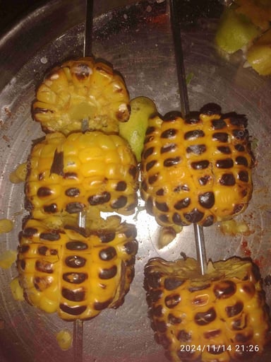 Tasty Grilled Corn cooked by COOX chefs cooks during occasions parties events at home