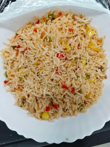 Tasty Mexican Rice cooked by COOX chefs cooks during occasions parties events at home